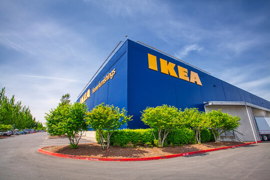 Portland, Oregon, USA-May 12, 2019: Ikea famous Swedish furniture store warehouse with its big yellow logo sign, near PDX airport in Portland. High quality picture for download
