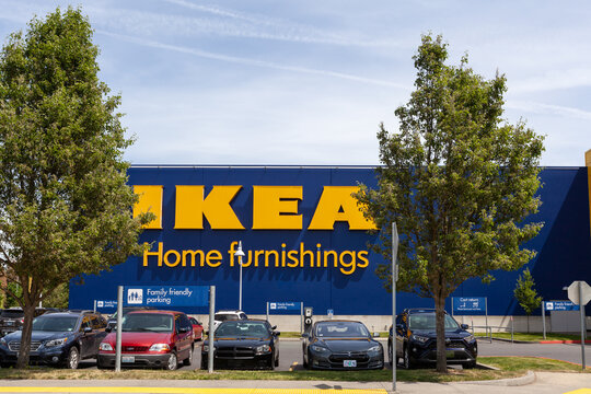 Portland, Oregon, USA-May 12, 2019: Ikea famous Swedish furniture store warehouse with its big yellow logo sign, near PDX airport in Portland. High quality picture for download