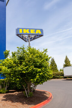 Portland, Oregon, USA-May 12, 2019: Ikea famous Swedish furniture store warehouse with its big yellow logo sign, near PDX airport in Portland. High quality picture for download