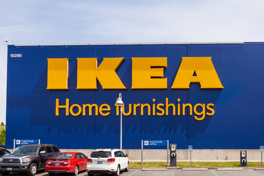 Portland, Oregon, USA-May 12, 2019: Ikea famous Swedish furniture store warehouse with its big yellow logo sign, near PDX airport in Portland. High quality picture for download
