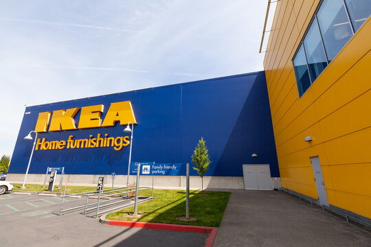 Portland, Oregon, USA-May 12, 2019: Ikea famous Swedish furniture store warehouse with its big yellow logo sign, near PDX airport in Portland. High quality picture for download