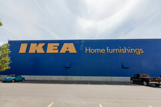 Portland, Oregon, USA-May 12, 2019: Ikea famous Swedish furniture store warehouse with its big yellow logo sign, near PDX airport in Portland. High quality picture for download