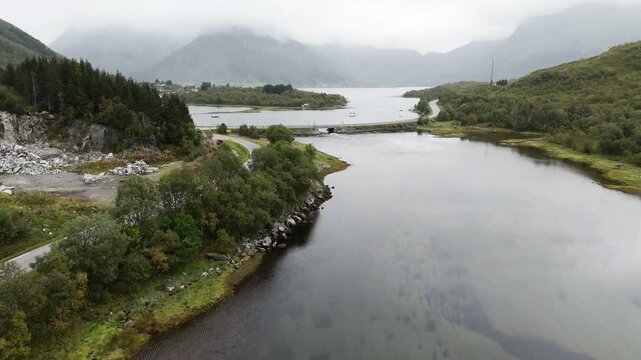 Drone flight over the Sildpollnes penisula in the Norwegian fjord in a foggy day