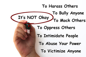 Hand written on It is not okay to all the negativity concept