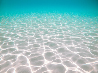 Turquoise waters and white sand in Mediterranean Sea in Blue Lagoon, Malta Island touristic landmark