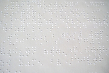 Braille book. Page written in braille alphabet for blind people,Caring for the Visually Impaired