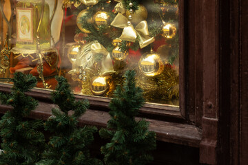 Fototapeta premium christmas store window, trees and balls, christmas decorations, winter atmosphere