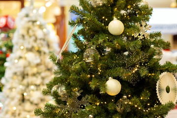 Christmas tree, bright lights, evergreen backdrop, December celebration