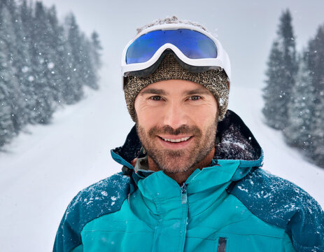 Winter Portrait of Happy Handsome Man Smiling Outdoors