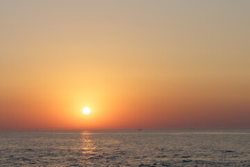 Serene sunset at the shoreline in Kolobrzeg, Kołobrzeg
