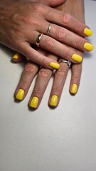The beauty of the natural nails. Perfect clean manicure. New trendy nail arts on young women hand. Beautiful nail polish in hand