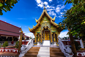 Fototapeta premium Background of a beautiful old church, Wat Phra Bat Thung Or, San Pa Tong area, Chiang Mai province, has beautiful sculptures.