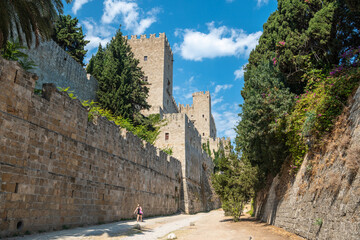 Medieval moat surrounding the walls of Old Town neighbourhood in Rhodes Town, Greece. The broad...