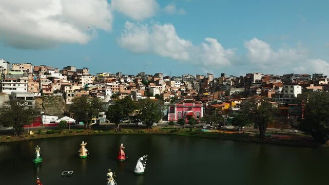 Orixa statues in the Dique de Tororo park in central Salvador, Bahia, Brazil. Eight sculptures of orixa, deity of Candomble on lake in Salvador.