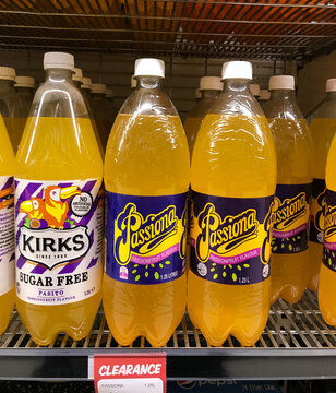 South Australia, Australia &ndash; September 1, 2024: Bottles of Passiona and Kirks passionfruit flavoured drinks on shelf of supermarket