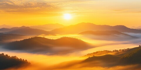 Breathtaking sunrise over misty mountains, casting warm golden light on serene hills and valleys, creating a peaceful atmosphere.