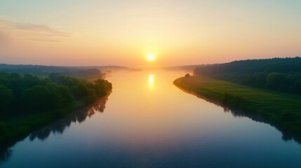 Fototapeta premium Hazy sunset over a calm river, humid weather, golden hour light