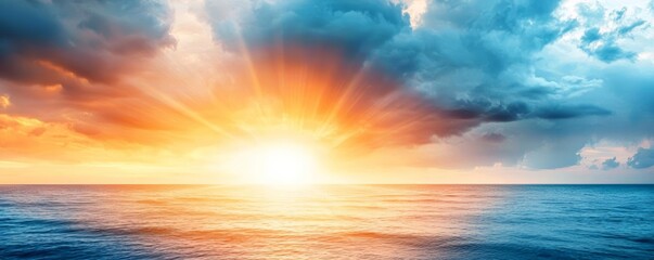 Sun rays breaking through dark storm clouds over the ocean, dramatic weather, hope after the storm