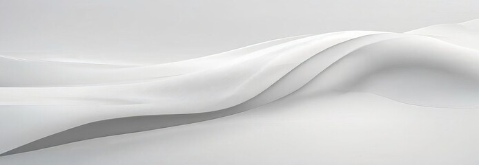 Obraz premium Abstract white wave-like shape on a white background.