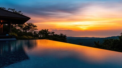 Sunset Reflections in Infinity Pool at Luxury Tropical Resort