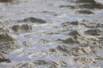 water run-off during ebb tide at low tide