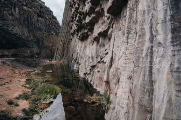 gorge with river of basalt columns, mountains in Armenia, symphony of stones