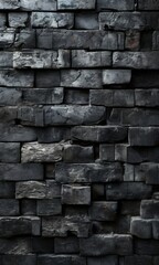 Naklejka premium a close-up view of a brick wall composed of dark-colored bricks arranged in a staggered pattern, creating a textured and visually interesting surface.