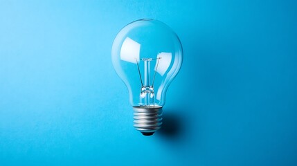 Light Bulb on a Blue Background