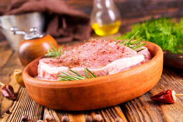 raw steak with aroma spice and salt