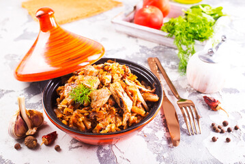 stew cabbage with fried meat