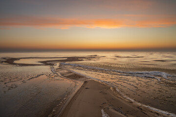 frozen sunset at the beach