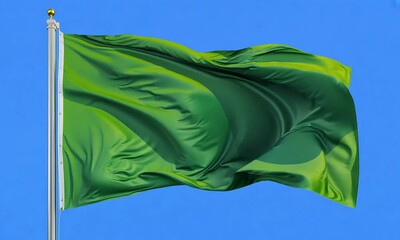 Green flag fluttering in wind, green screen - 4K video stock