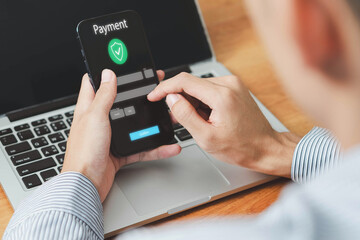 Digital Banking and Online Payment Concept. Man using mobile phone for transactions and online shopping, E-transaction and financial technology modern online shopping experience, Online purchase.