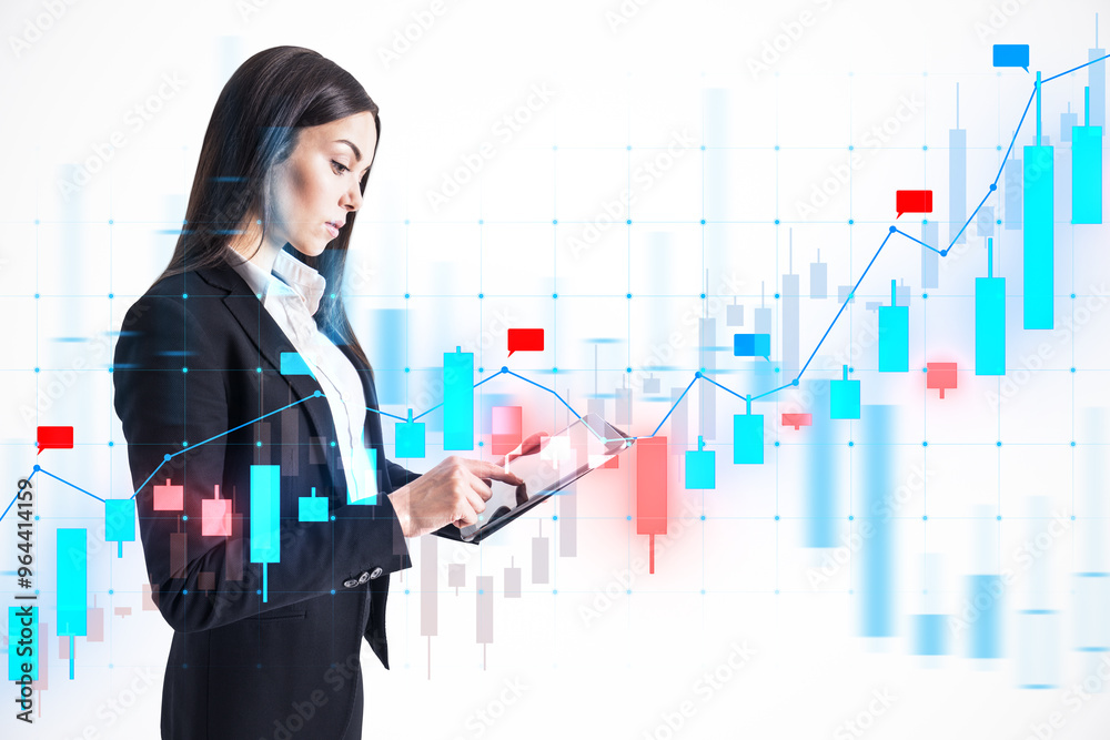 Poster businesswoman analyzing financial data on a tablet with a virtual forex trading graph in the backgro