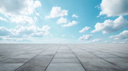 Fototapeta premium Blue Sky with White Clouds and a Grey Concrete Surface