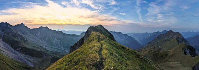 Panorama Sunset on the Lauiberg above the Muotathal and Richisau Glarus. Beautiful ridge hike to...