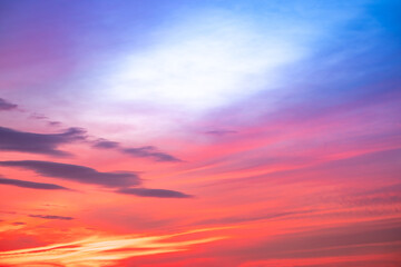 Fototapeta premium Beautiful , luxury soft gradient orange gold clouds and sunlight on the blue sky perfect for the background, take in everning,Twilight, Large size, high definition landscape photo