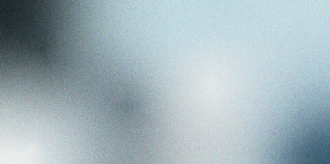 Obraz premium Grungy light gray and silver grainy gradient background with grainy noise abstract banner design. Abstract reflective shiny gray & white foil gradient blurred shine. Colorful blurry gradient abstract 