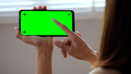 phone with finger touching the screen, smartphone green screen	

