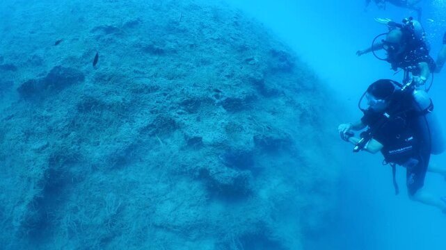 underwater scenery of rocks and reefs mediterranean sea blue water