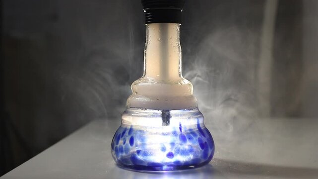 hookah flask with water. hookah smoke