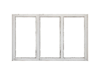 An elongated white wooden window of horizontal orientation with three vertical sections is isolated