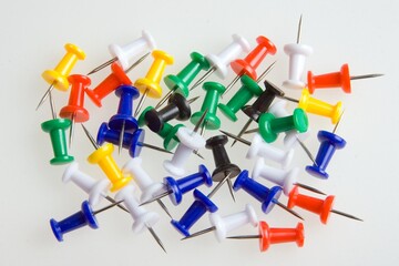 Colored push pin in different angles. Realistic attach button set.