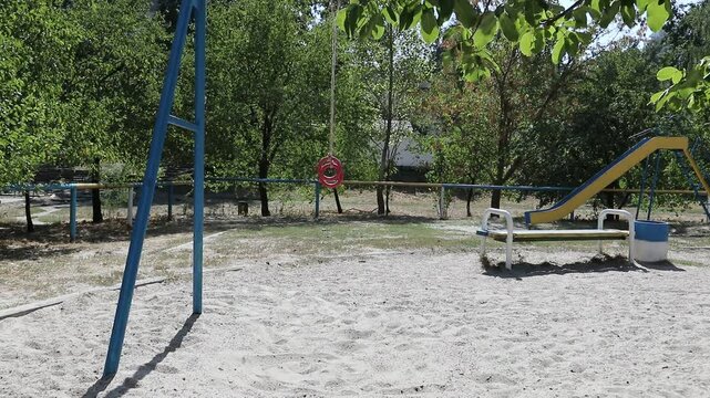 Plastic gymnastic rings on an empty playground
