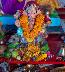A Closeup shot Ganpati Installed in a Pandal during the 10 Day Ganesh Festival, the idols are immersed in heavy water bodies after the 10 days.