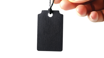 Close up of a hand pinches a blank black price tag on a transparent background for Black Friday or sale event.