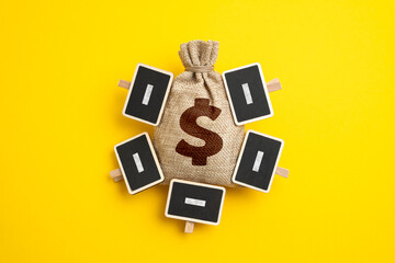 Budget expenditure items. The dollar money bag is covered with minuses. Melting savings. Limited funds. Business and budget losses. Reduce spending