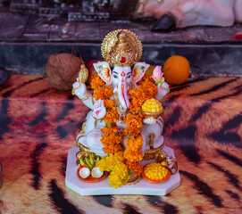 A Closeup shot Ganpati Installed in a Pandal during the 10 Day Ganesh Festival, the idols are immersed in heavy water bodies after the 10 days.