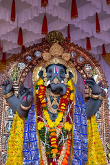 A Closeup shot Ganpati Installed in a Pandal during the 10 Day Ganesh Festival, the idols are immersed in heavy water bodies after the 10 days.