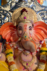 A Closeup shot Ganpati Installed in a Pandal during the 10 Day Ganesh Festival, the idols are immersed in heavy water bodies after the 10 days.